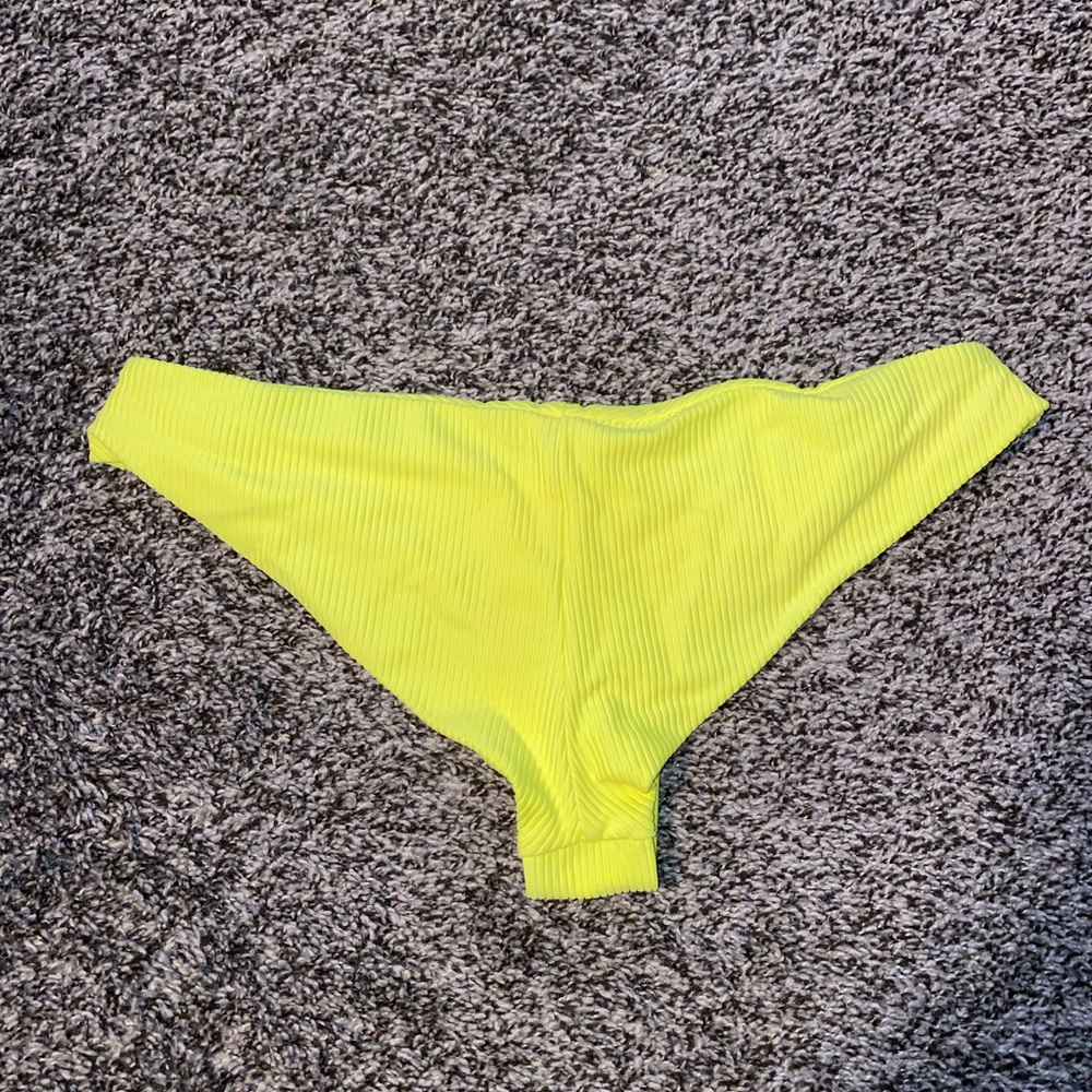 Frankie’s Bathing suit: neon yellow// size medium// moderate coverage